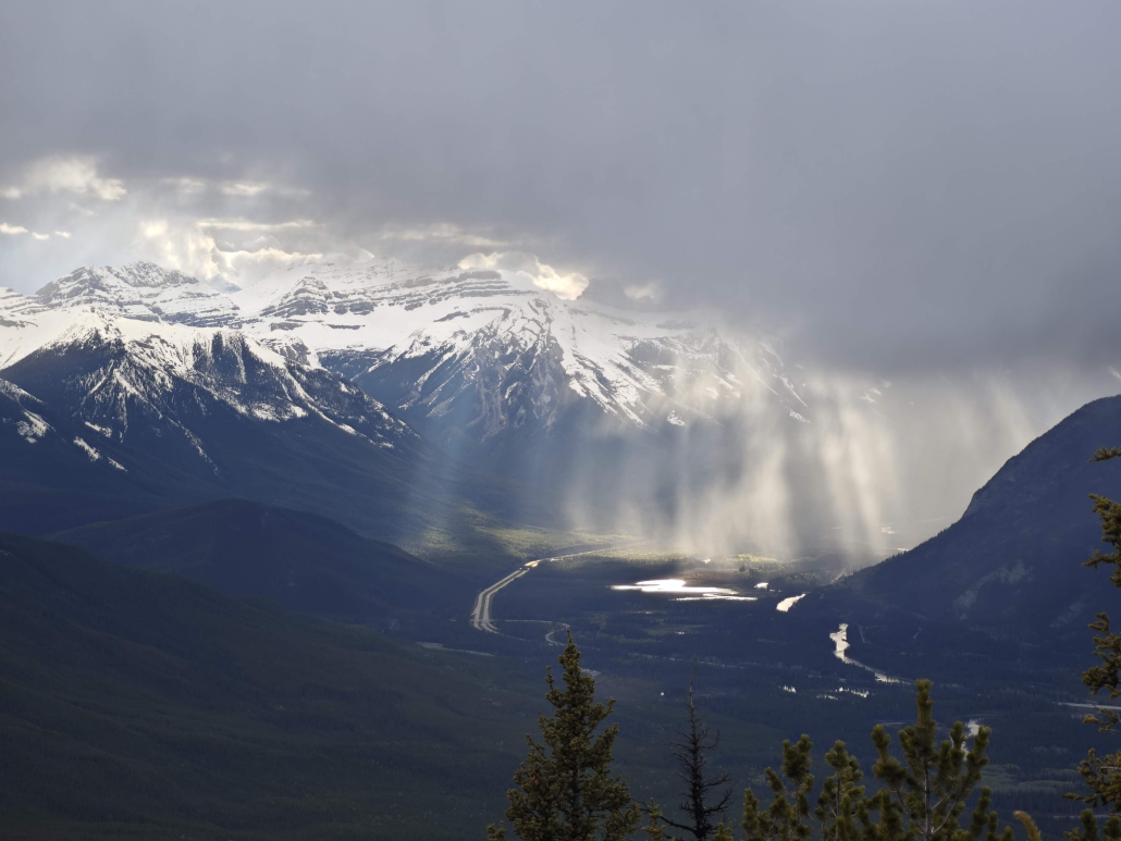 sun-breaking-through-storm-banff-gondola